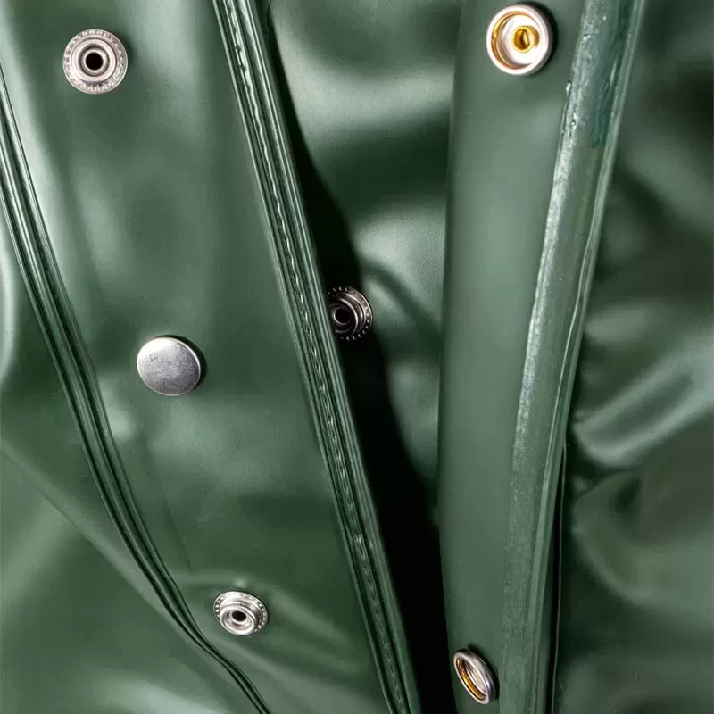 N980J green, PVC raincoat, storm flap with two overlapping flaps and press studs